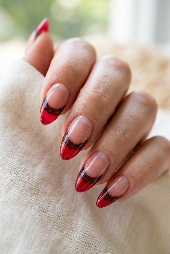 Cherry red jelly tip nails with fine black lace edge
