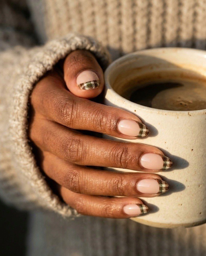 Short almond nails with flannel French tips in bark brown, moss green and off white
