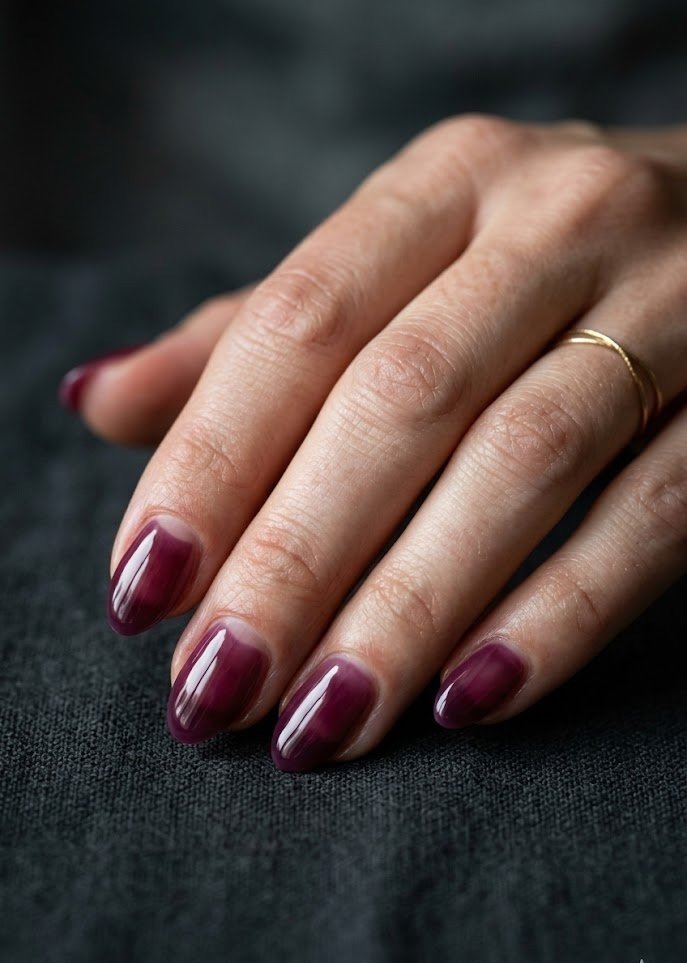 Moody deep plum berry jelly nails with dimensional sheer finish
