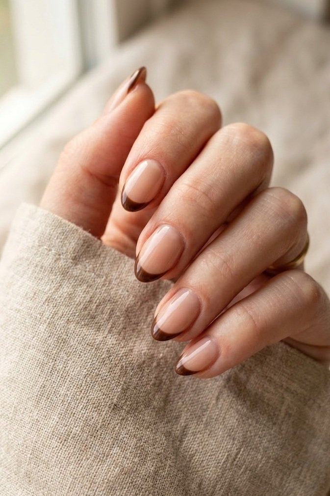 Slim classic chocolate brown French tip on short almond nails