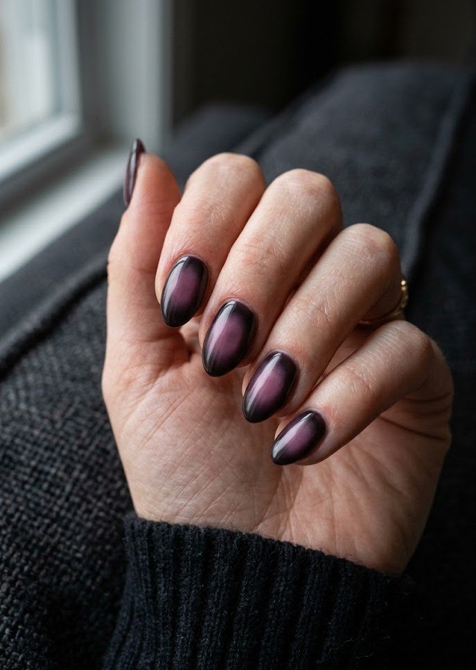 Glazed pearl smoky plum nails on short almond shape