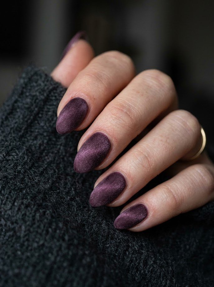 Smoky plum velvet finish nails on short almond shape